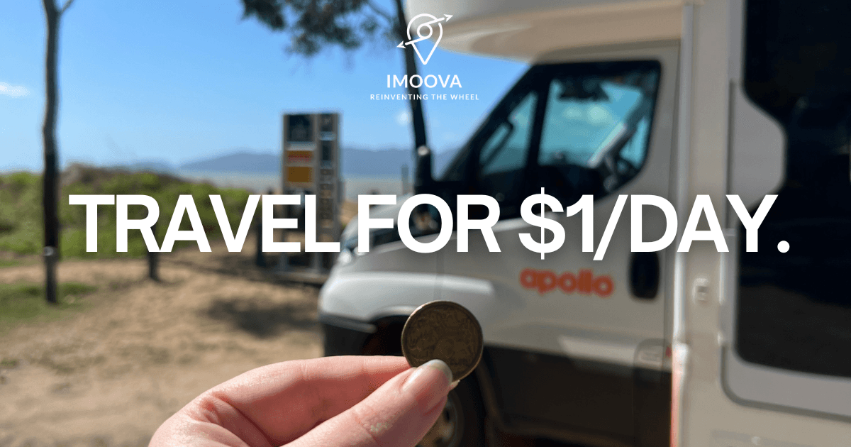Holding $1 coin in front of motorhome